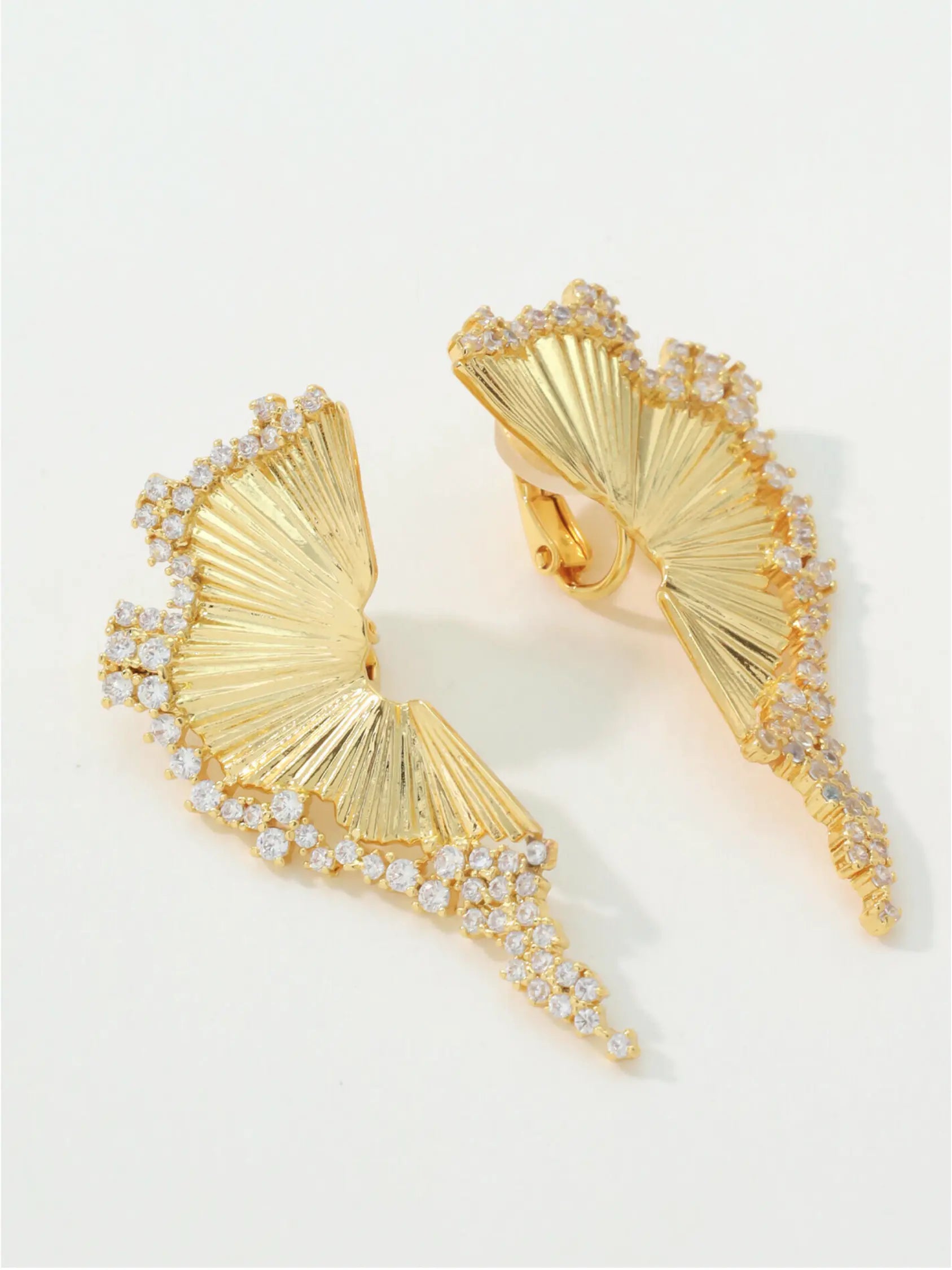 Gold plated ginkgo leaf clip-on earrings with Swarovski crystals – All-Glows Earrings Collection