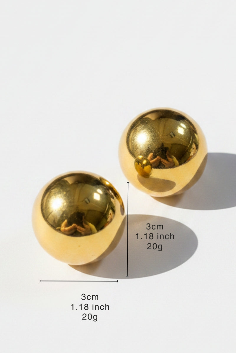 A pair of Aura Sculpted Dome Studs on a clean white background showing dimensions of 3cm or 1.18 inch diameter, highlighting the high-shine 18K gold plated brass material.