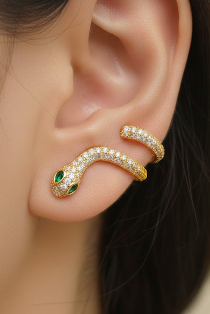 Eden Snake Earring in 18K Gold Plated with Emerald Green Eyes and Sparkling Zirconia on Female Model.