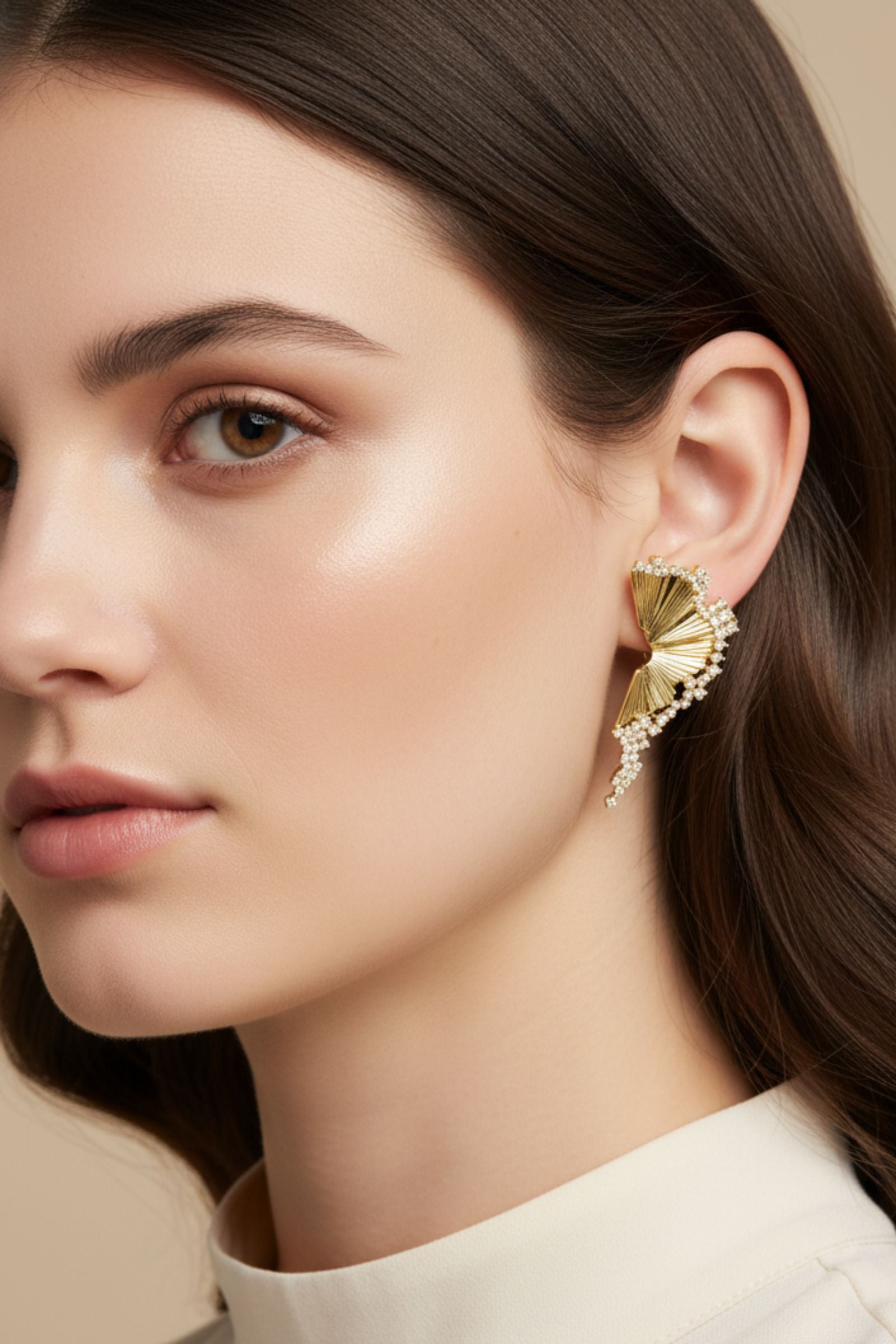 Close-up of a model wearing 2026 trendy 18K gold earrings
