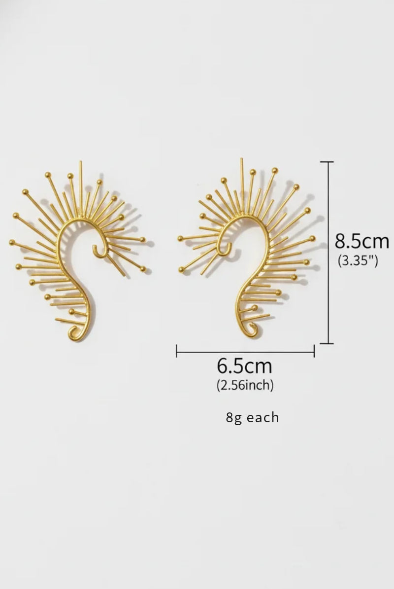 8.5cm oversized gold spiked earrings dimensions, abstract s-shape sun rays earrings, sculptural jewelry front view.