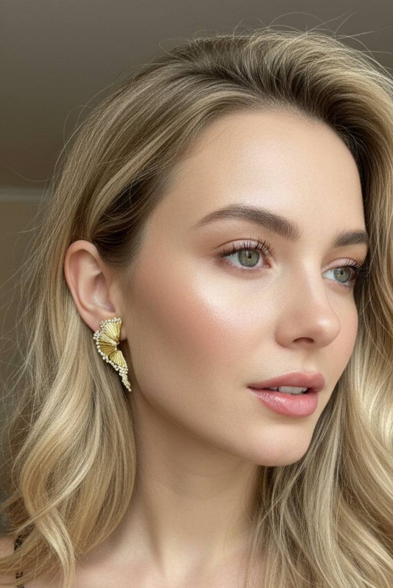 Aurelia sunburst pleated gold earrings for bridal jewelry styling in London boutique.