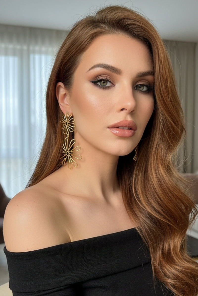 Flora Double Daisy gold earrings on a model with glamorous makeup, perfect botanical dangle earrings for bridesmaids in Los Angeles.
