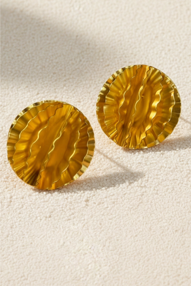 Aurelia gold honeycomb textured disc stud earrings with organic pleated surface for a modern statement look.