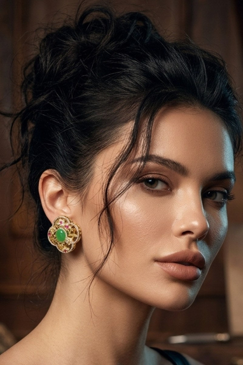 Model wearing green crystal quatrefoil stud earrings, view 4