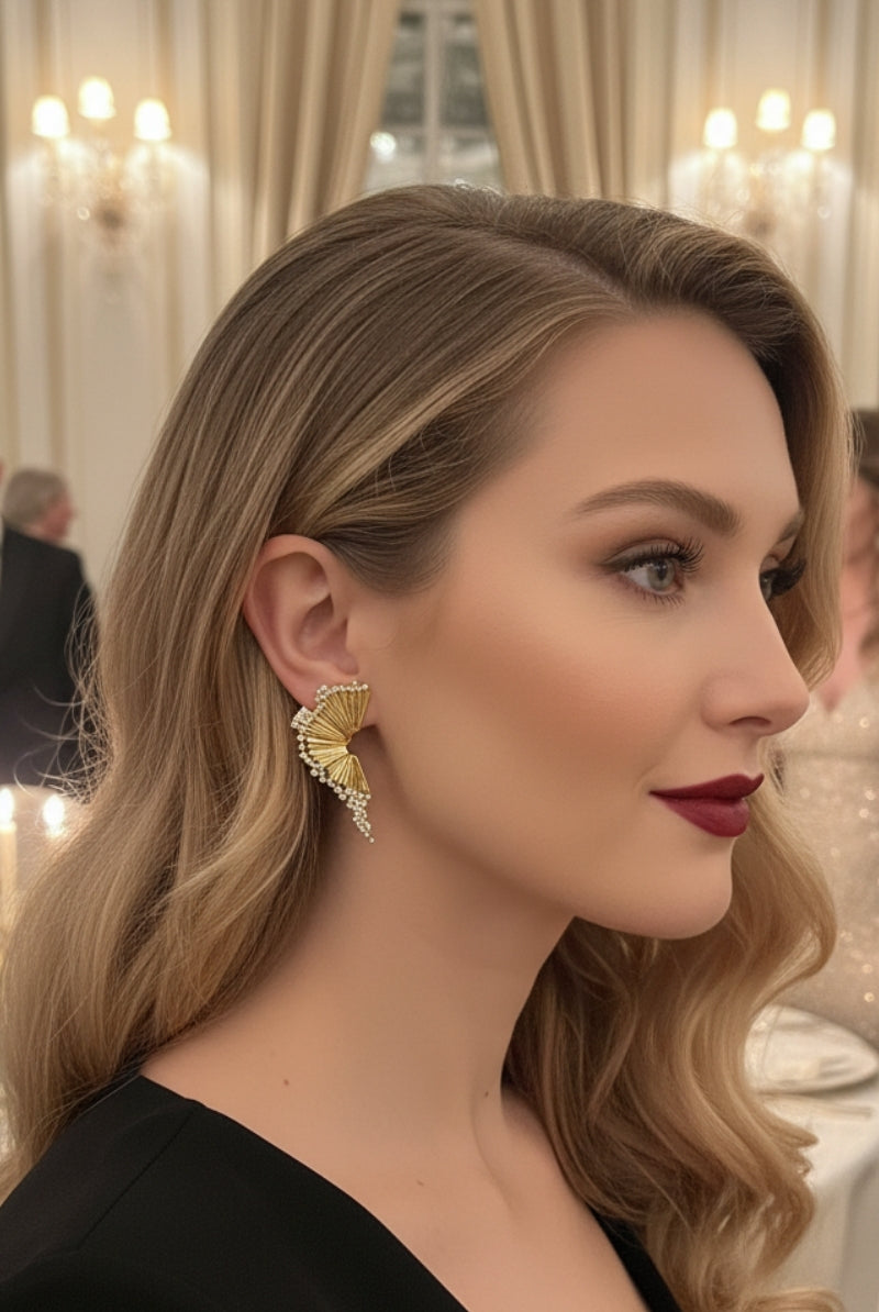 Luxury gold fan statement earrings for high-end evening gala and red carpet in Paris.