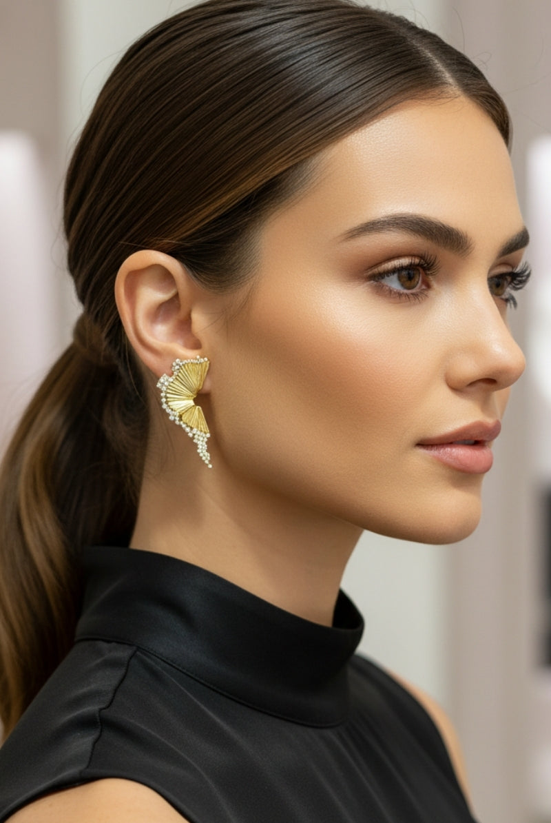 Architectural gold fan earrings for minimalist luxury corporate event styling in Sydney.