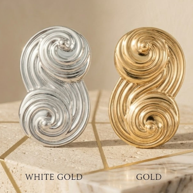 Seraphina swirl stud earrings in white-gold-plated and yellow-gold-plated finishes