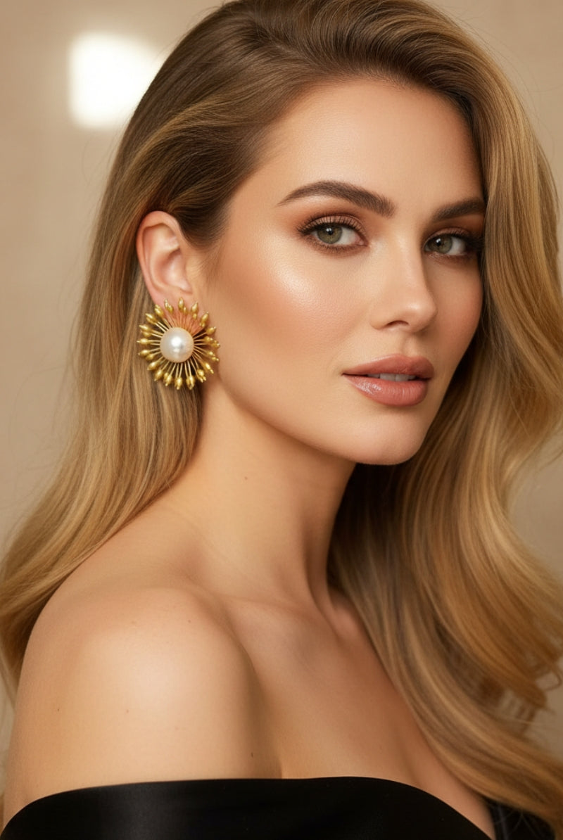 Side view of Hera vintage-inspired sunburst pearl studs, high-end fashion statement earrings for cocktail parties and special occasions.