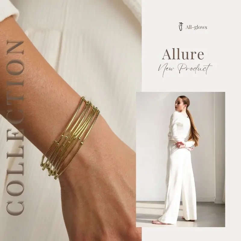 Layered gold bracelets styled on wrist