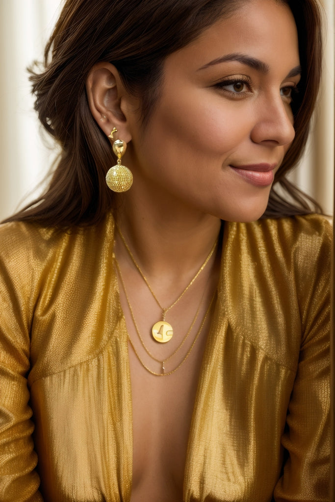 Earth Earrings – 18K Gold-Plated Textured Sphere with Landmass-Inspired Links All-Glows