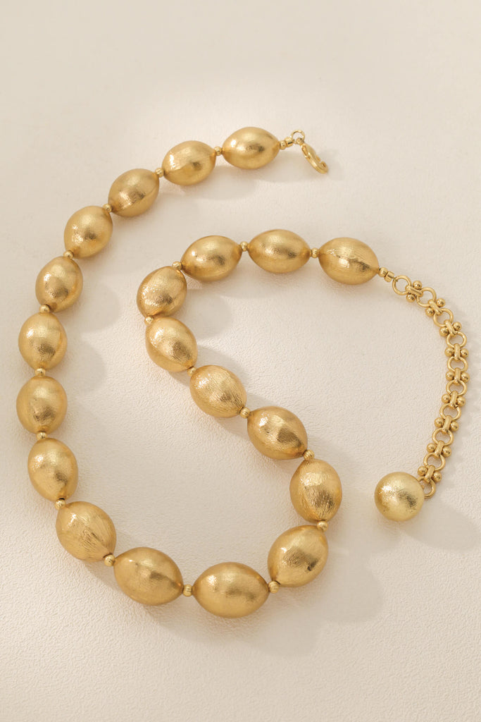 Queen Necklace – 18K Gold-Plated Brass Necklace with Textured Olive-Shaped Beads All-Glows