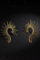 Lightweight 18K gold plated sunburst ear crawlers, sculptural celestial jewelry.