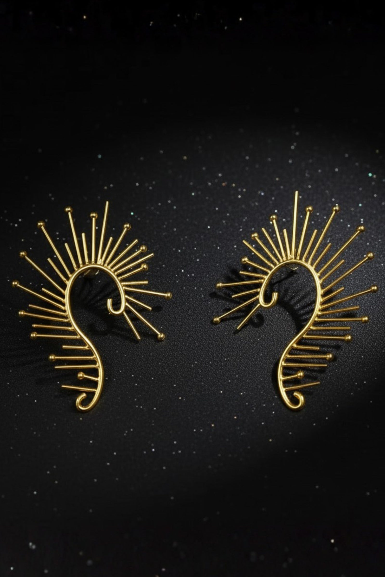 Lightweight 18K gold plated sunburst ear crawlers, sculptural celestial jewelry.