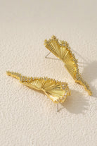 A high-angle product photograph of Aurelia fan-shaped gold earrings with irregular pavé cubic zirconia edge with S925 silver posts. These sculptural nature-inspired earrings are adorned with shimmering Swarovski crystals. Perfect hypoallergenic everyday luxury under $50.