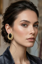 Model wearing black czech crystal halo stud earrings, view 4