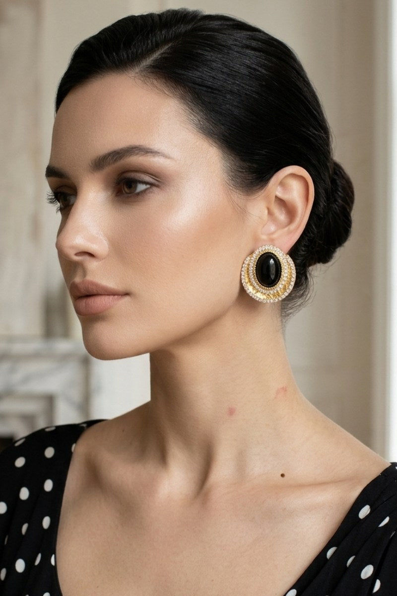 Model wearing black czech crystal halo stud earrings, view 1