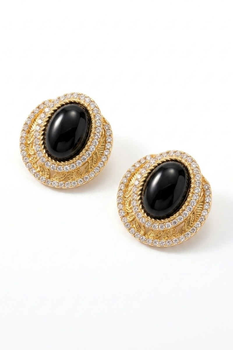 Pair of black czech crystal halo stud earrings on a white background