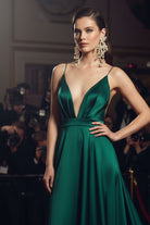 Side view of fluid pearl earrings paired with an elegant evening look for a luxury gala in New York City.