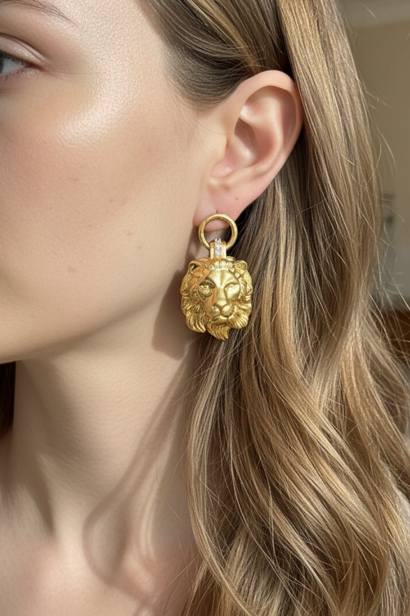 Model wearing bold lion head door knocker earrings, a perfect statement for Los Angeles streetwear fashion.