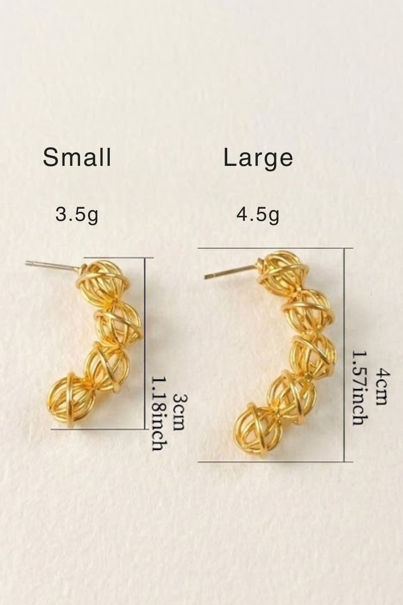 A side-by-side product measurement chart showcasing the small 4-orb variant at 3cm and the large 5-orb variant at 4cm. The clean visual outlines the precise dimensions and lightweight specifications of these 18K gold-plated brass hollowed statement hoops.