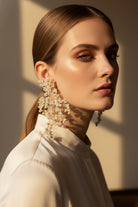 Elysian Fluid Pearl Drops featuring a high-luster shell pearl and organic molten 18K gold plated settings for a sophisticated bridal look.