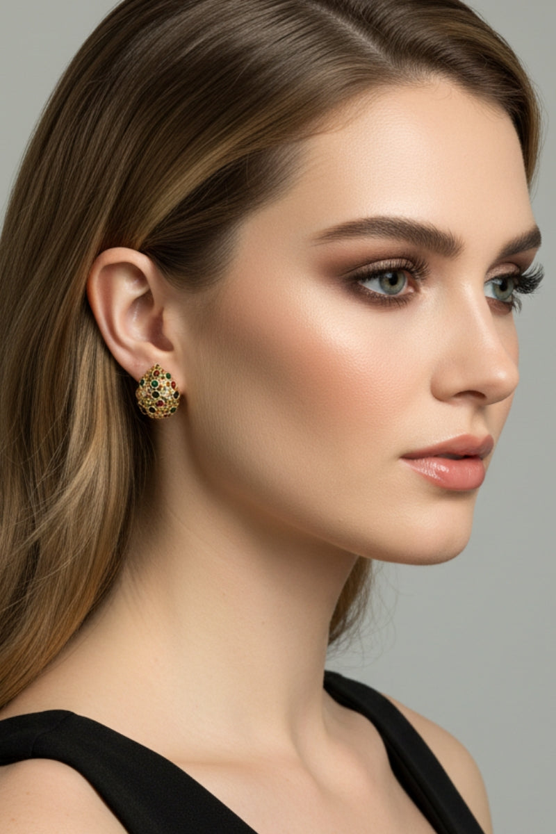 Side view of a sophisticated model in a black dress wearing colorful oval crystal cluster studs, perfect for a Los Angeles rooftop dinner or cocktail party.
