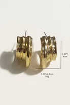 Size reference for triple-ribbed wave hoop earrings showing visible dimensions