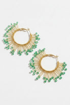 Pair of solburst wire-wrapped beaded sunburst hoop earrings in the Seafoam variant on a white background